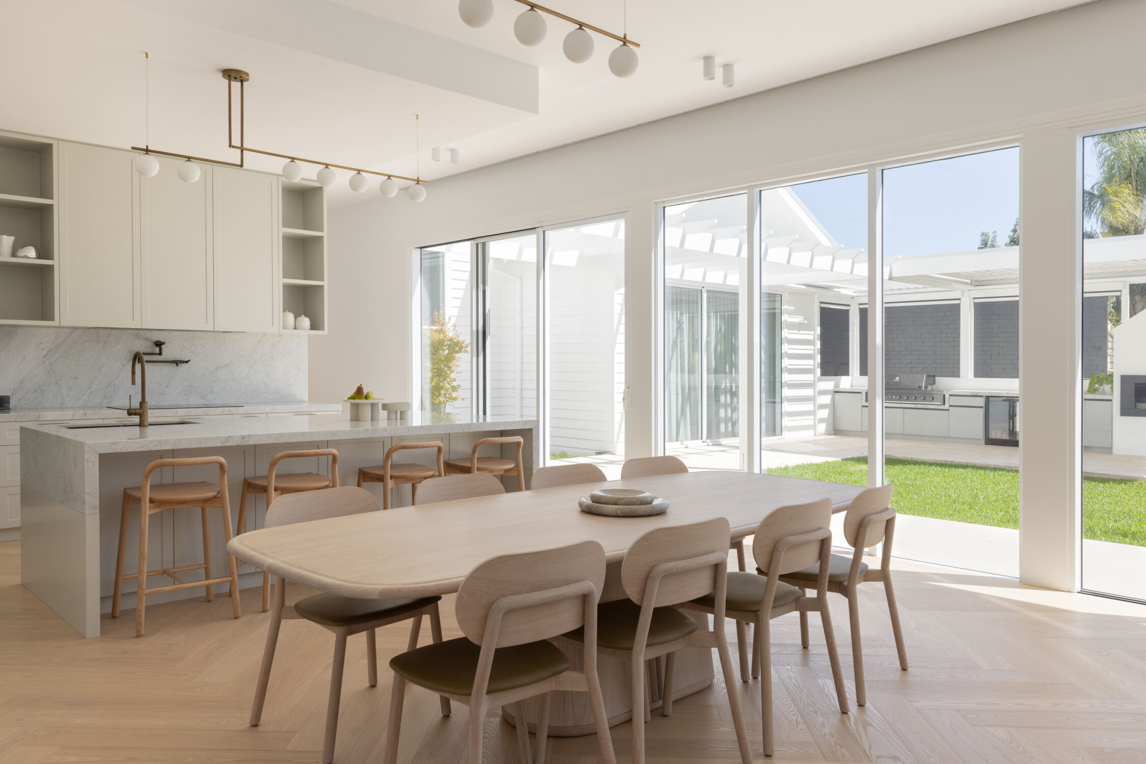Modern open-plan kitchen with stone island.