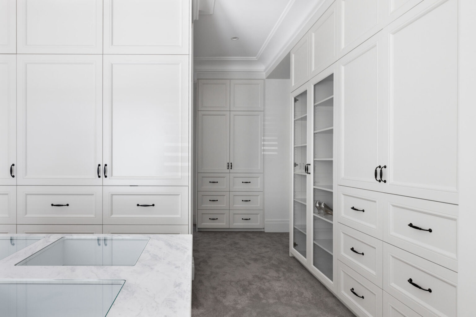Master Robe with custom French provincial cabinetry