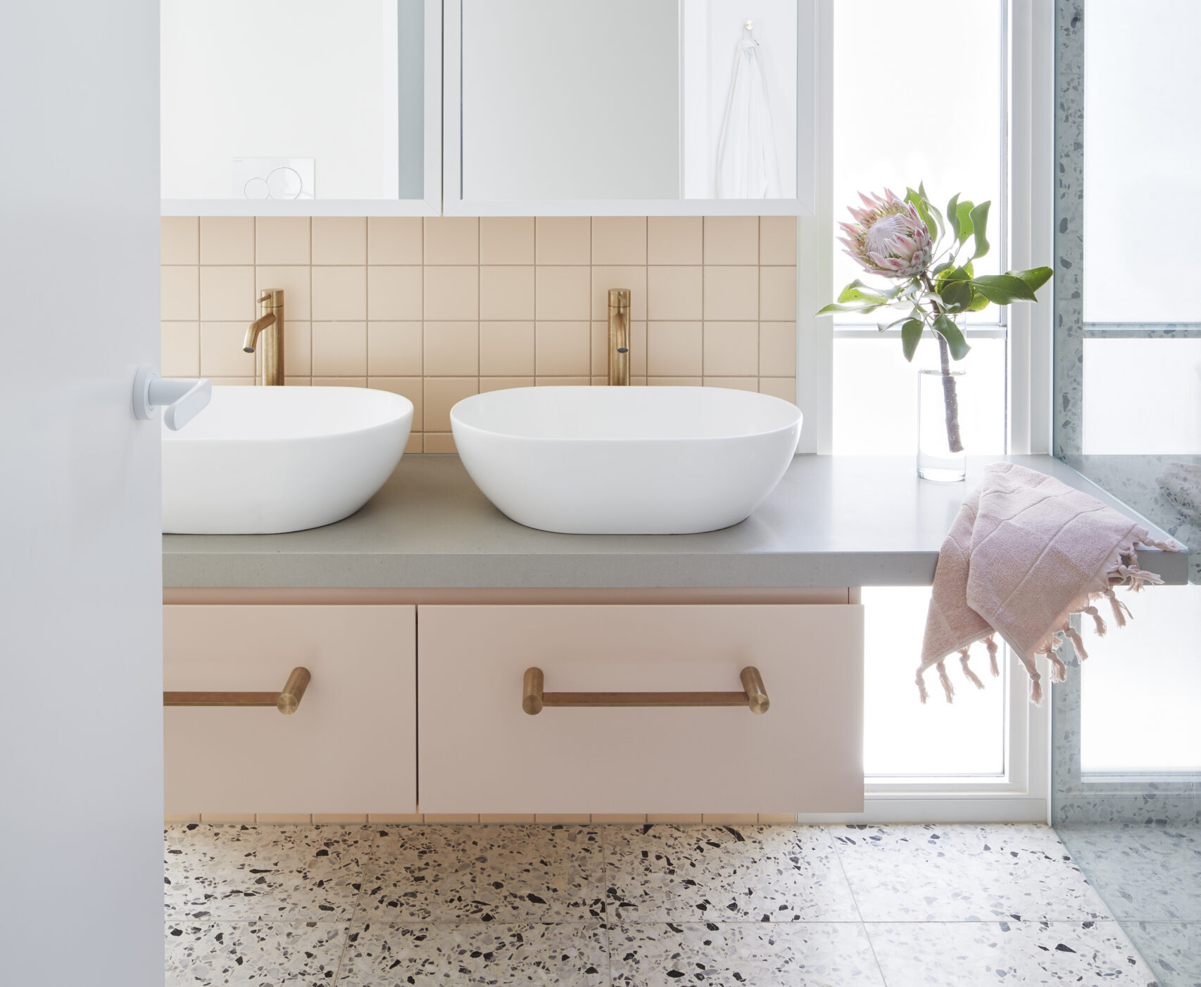 Peach Vanity with Terrazzo Tiles