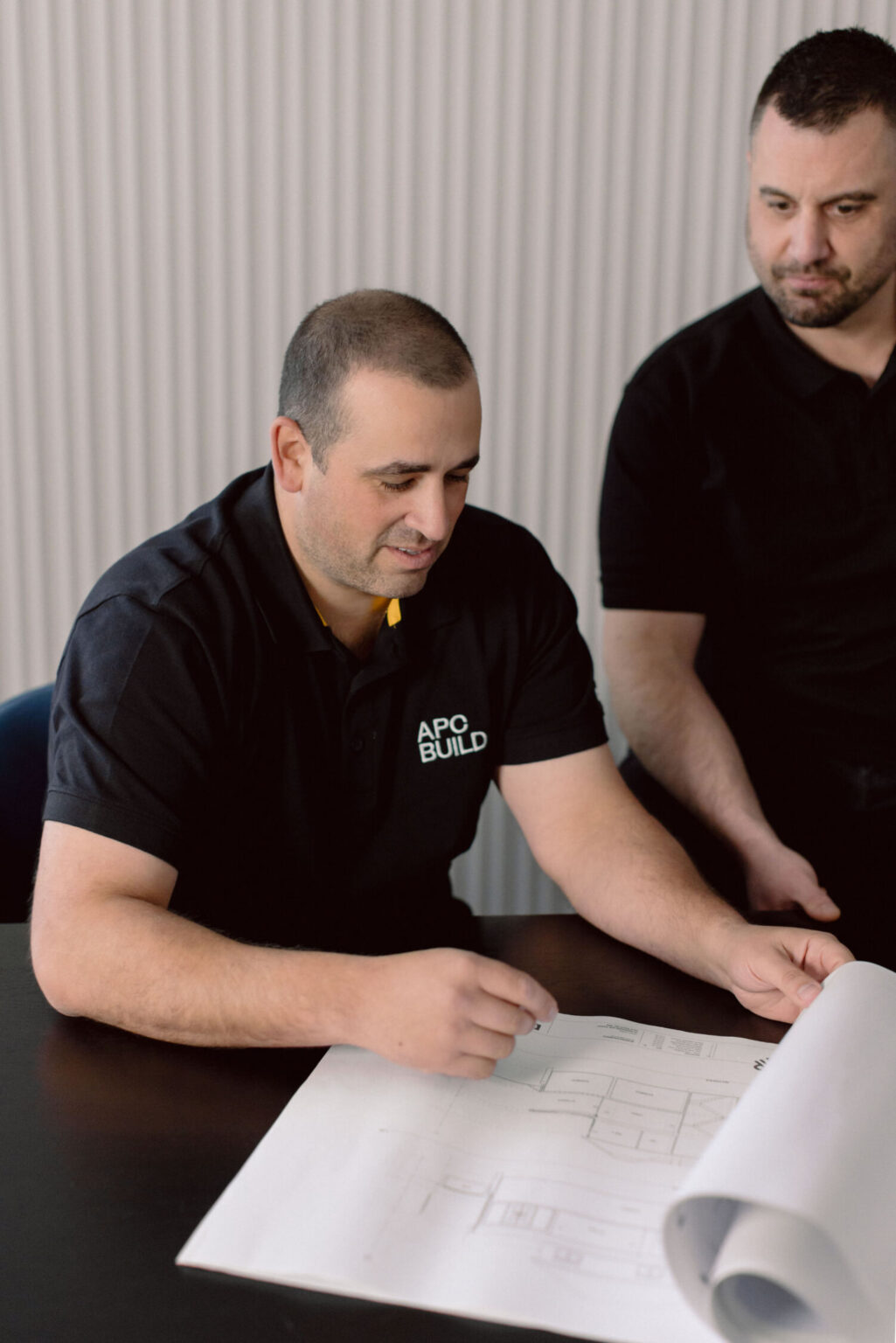 Peter Reviewing Plans in meeting - Early Contract Involvement
