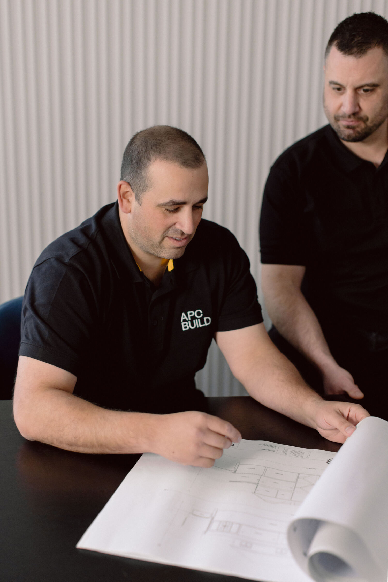 Peter Reviewing Plans in meeting - Early Contract Involvement