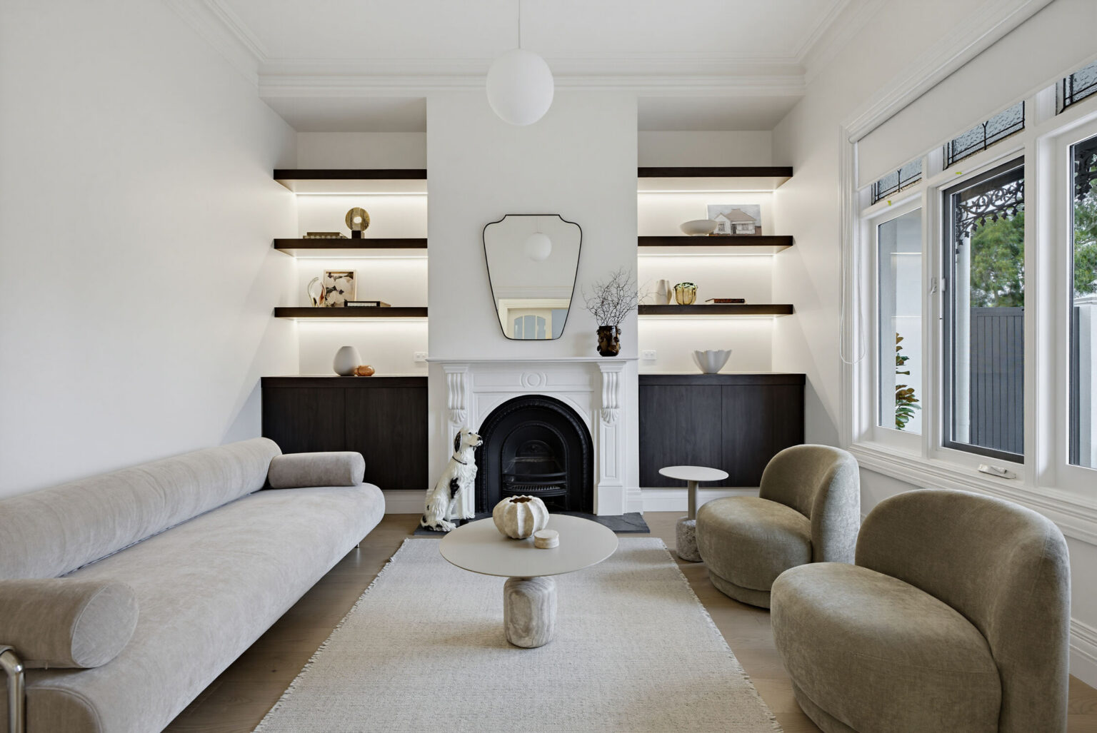 A restored and renewed sitting room with inbuilt custom joinery
