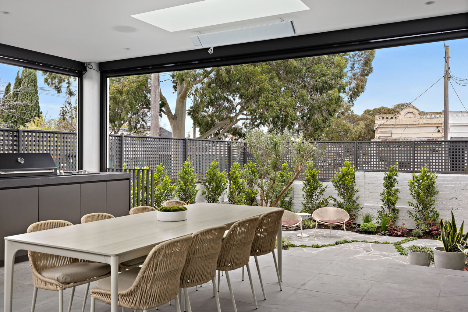 Alfresco entertainment space looking out of landscaped garden